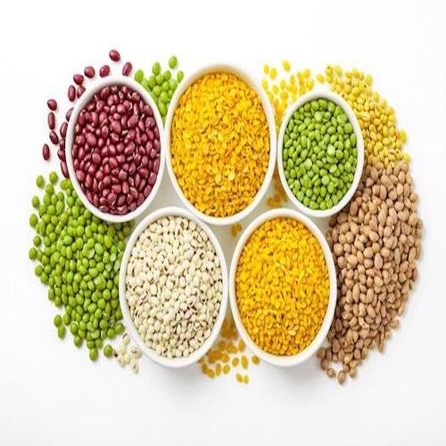 assortment of legumes in bowls free photo